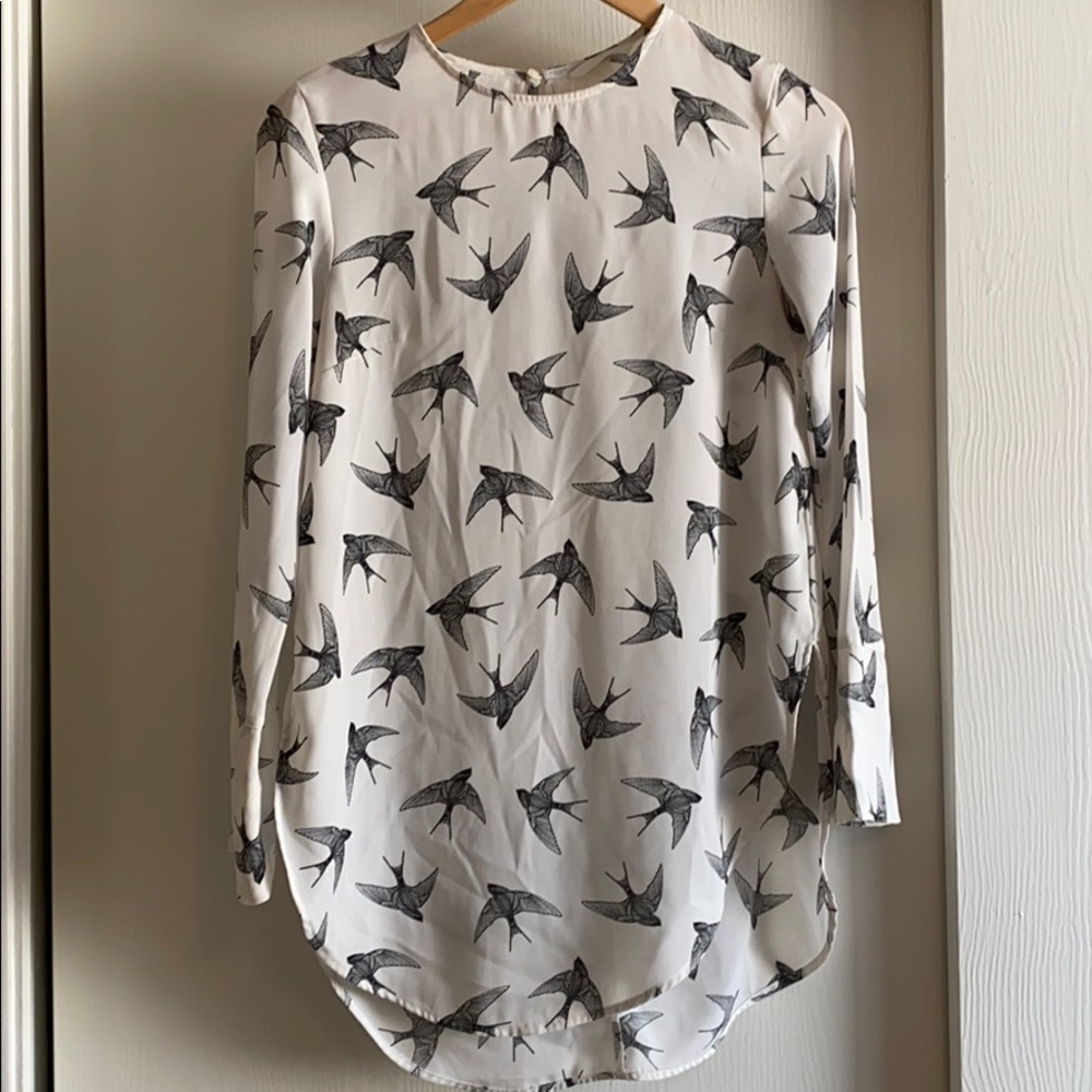 The bird print long blouse